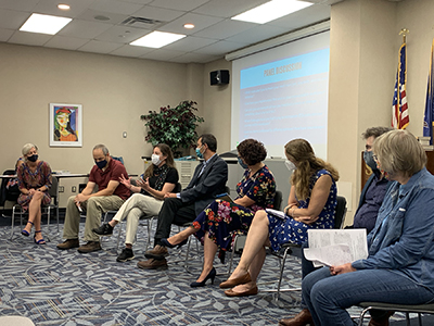 JEDI board member Jill Santiago facilitates a panel discussion in 2021